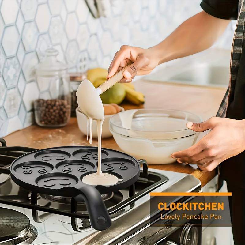 Tigaie pentru clatite, Zola®, 7 fete amuzante, aluminiu si otel inoxidabil, diametru tigaie 26 cm, diametru forma 6.5 cm Tigaie pentru clatite, Zola®, 7 fete amuzante, aluminiu si otel inoxidabil, diametru tigaie 26 cm, diametru forma 6.5 cm